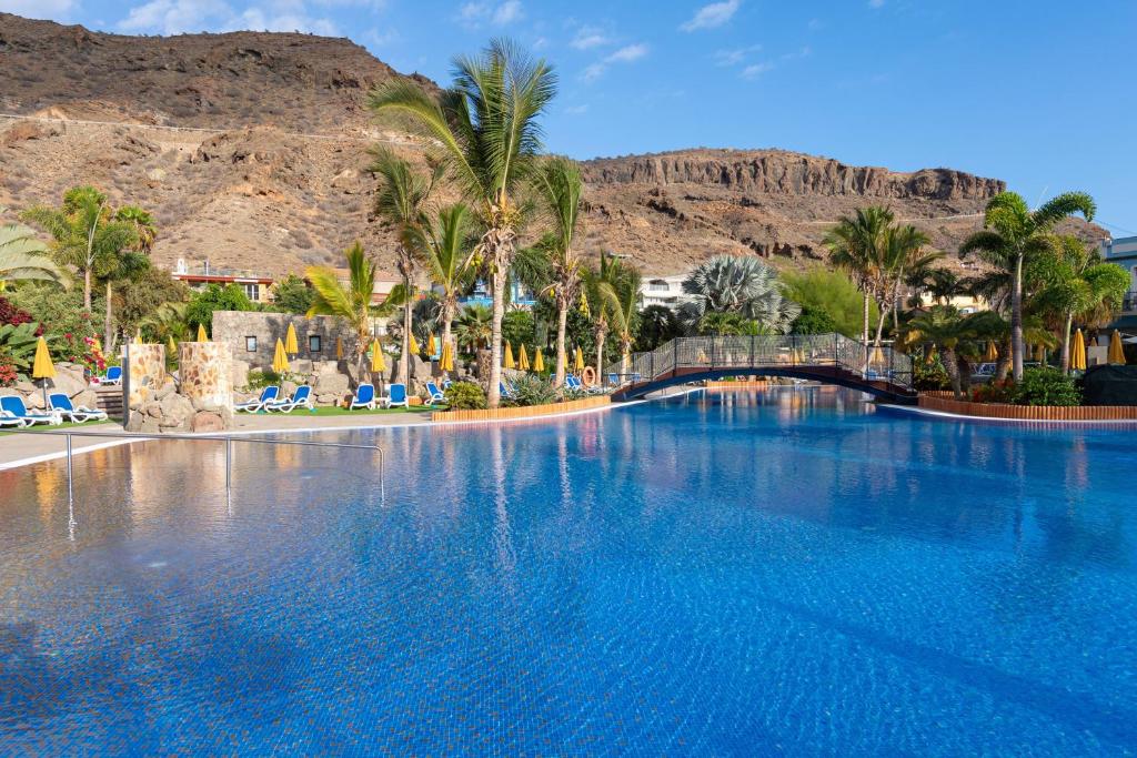 10 Incredible Water Accommodations to Dive Into This Summer Water Accommodations Mogan Gran Canaria Resort Pools Village 1