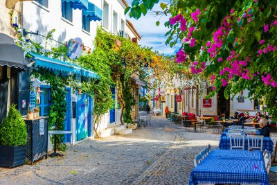 Alaçatı Turkey travel 2026: cobbled streets and whitewashed stone houses in the old town